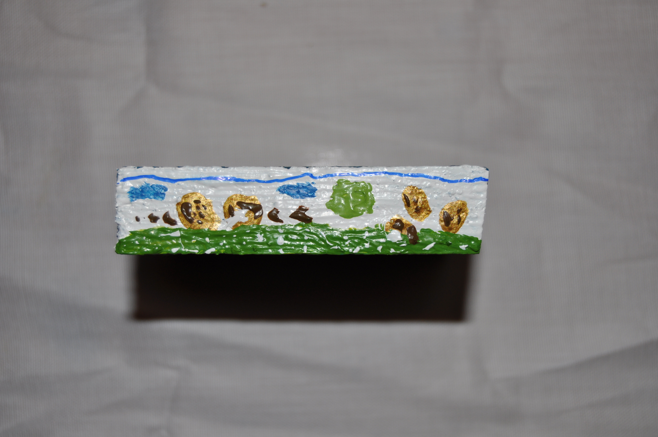 1Pintura Acrílico sobre madera.  8x1,5 cm